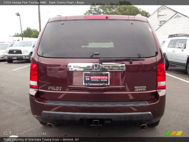 Dark Cherry Pearl / Beige 2009 Honda Pilot Touring 4WD