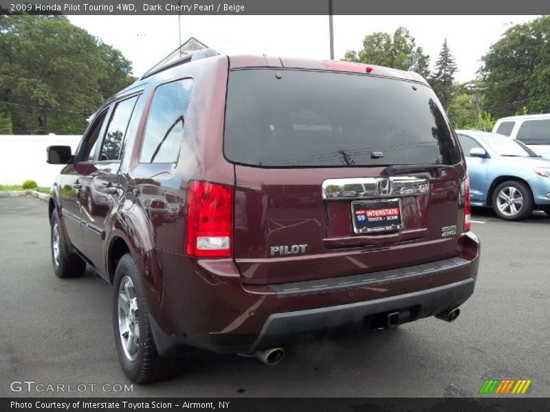 Dark Cherry Pearl / Beige 2009 Honda Pilot Touring 4WD