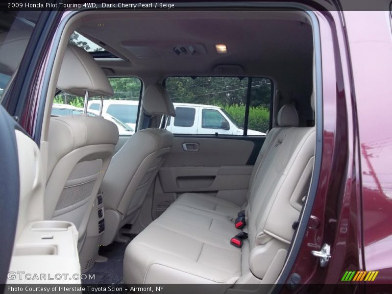 Dark Cherry Pearl / Beige 2009 Honda Pilot Touring 4WD
