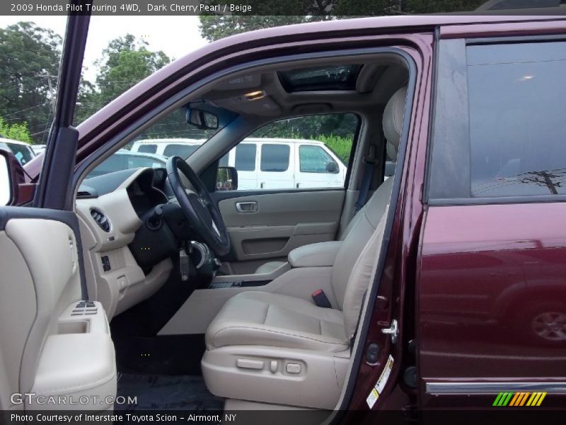 Dark Cherry Pearl / Beige 2009 Honda Pilot Touring 4WD