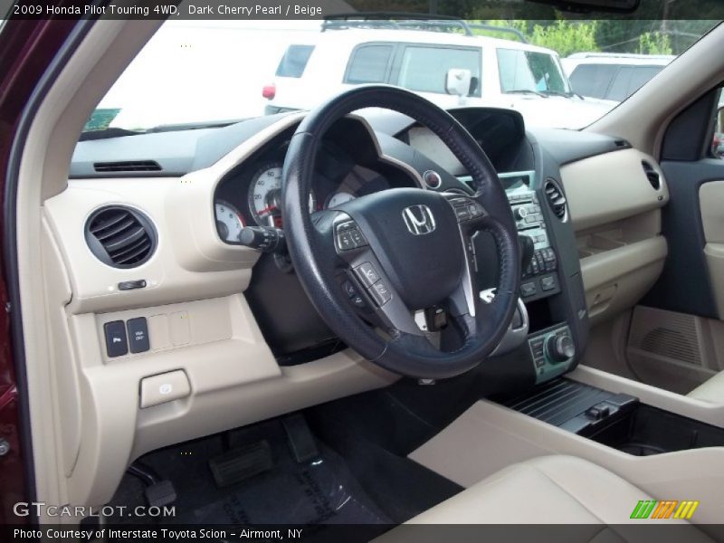 Dark Cherry Pearl / Beige 2009 Honda Pilot Touring 4WD