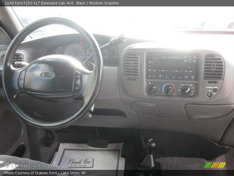 Black / Medium Graphite 1999 Ford F150 XLT Extended Cab 4x4