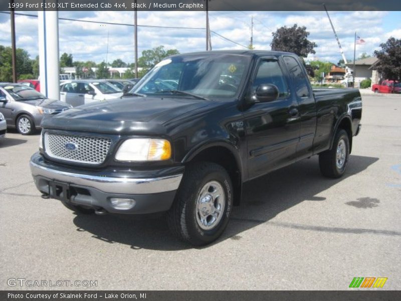 Front 3/4 View of 1999 F150 XLT Extended Cab 4x4