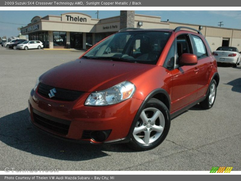 Sunlight Copper Metallic / Black 2009 Suzuki SX4 Crossover Technology AWD