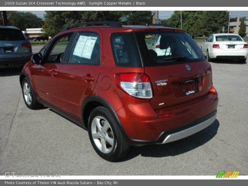 Sunlight Copper Metallic / Black 2009 Suzuki SX4 Crossover Technology AWD