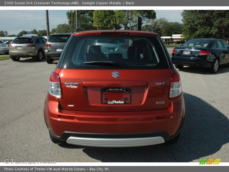 Sunlight Copper Metallic / Black 2009 Suzuki SX4 Crossover Technology AWD