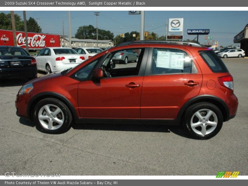 Sunlight Copper Metallic / Black 2009 Suzuki SX4 Crossover Technology AWD