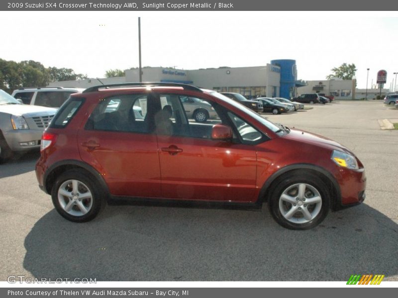 Sunlight Copper Metallic / Black 2009 Suzuki SX4 Crossover Technology AWD