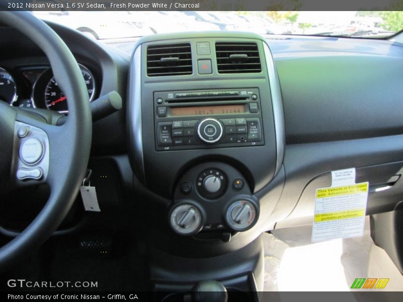 Fresh Powder White / Charcoal 2012 Nissan Versa 1.6 SV Sedan