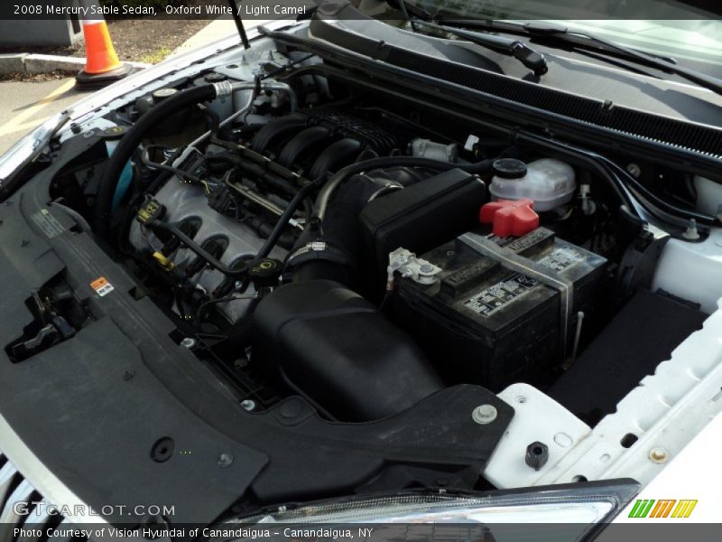 Oxford White / Light Camel 2008 Mercury Sable Sedan