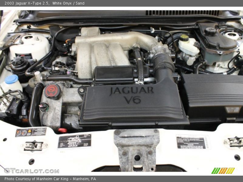 White Onyx / Sand 2003 Jaguar X-Type 2.5