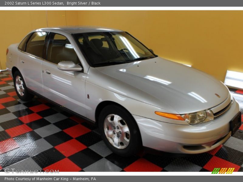 Bright Silver / Black 2002 Saturn L Series L300 Sedan