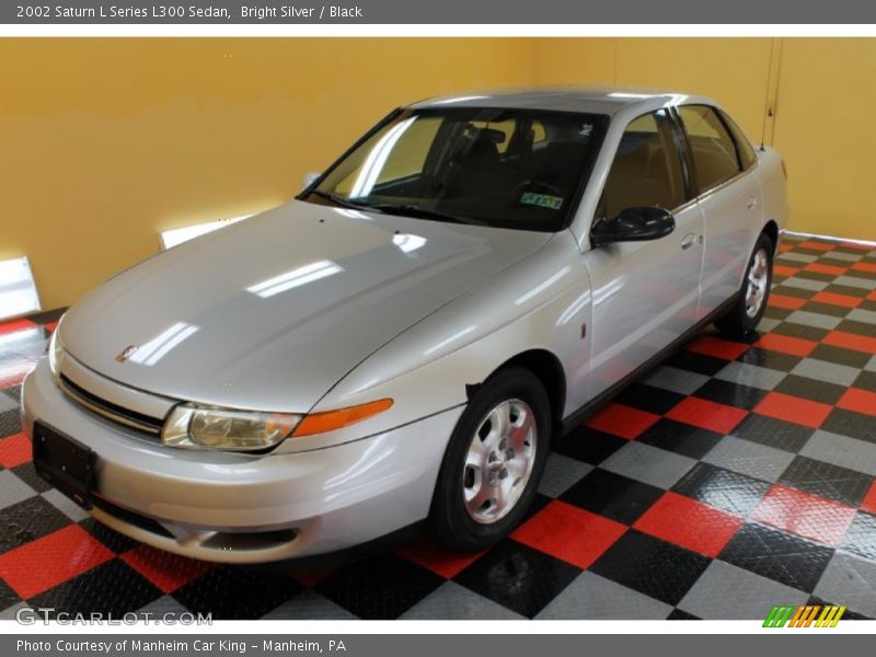 Bright Silver / Black 2002 Saturn L Series L300 Sedan