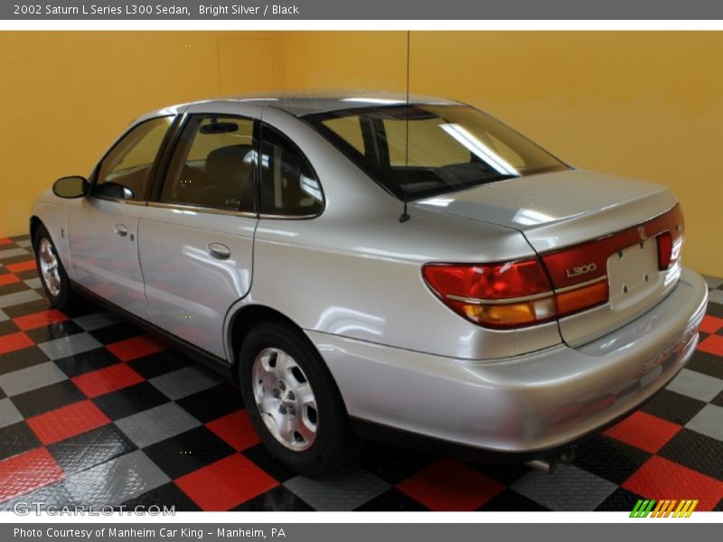 Bright Silver / Black 2002 Saturn L Series L300 Sedan