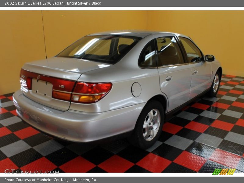 Bright Silver / Black 2002 Saturn L Series L300 Sedan
