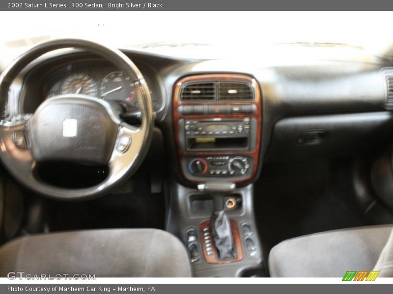 Bright Silver / Black 2002 Saturn L Series L300 Sedan