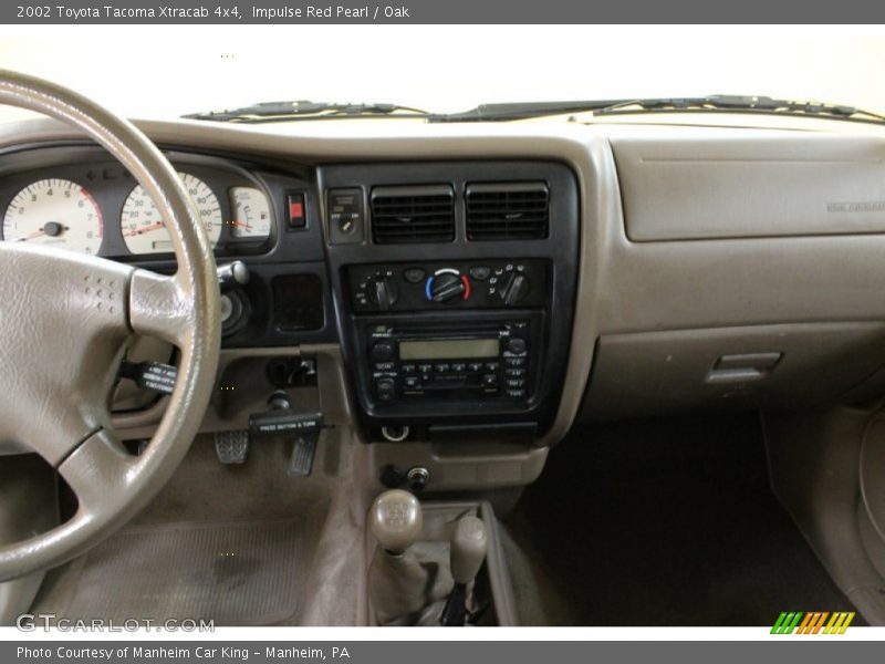 Impulse Red Pearl / Oak 2002 Toyota Tacoma Xtracab 4x4