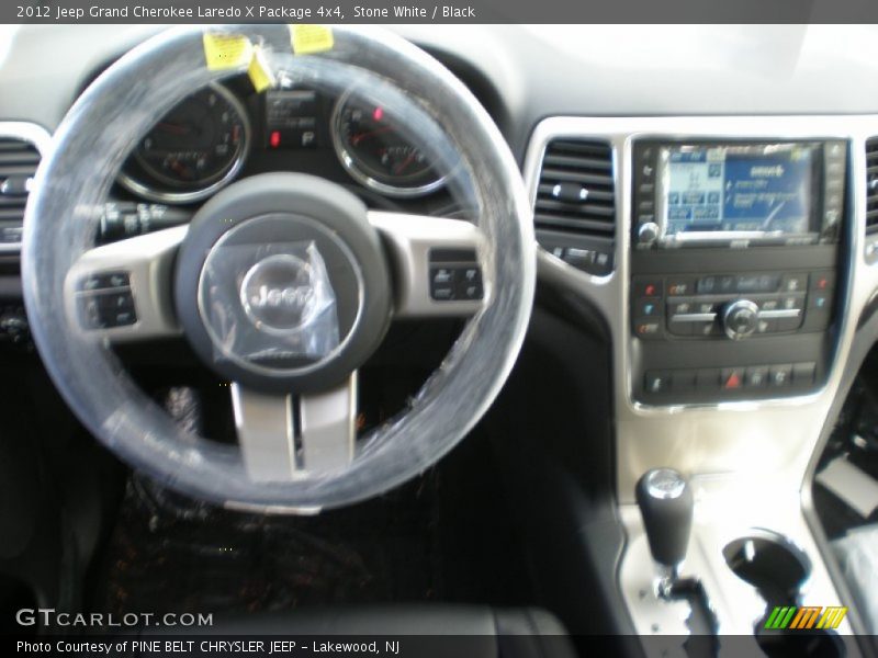 Stone White / Black 2012 Jeep Grand Cherokee Laredo X Package 4x4