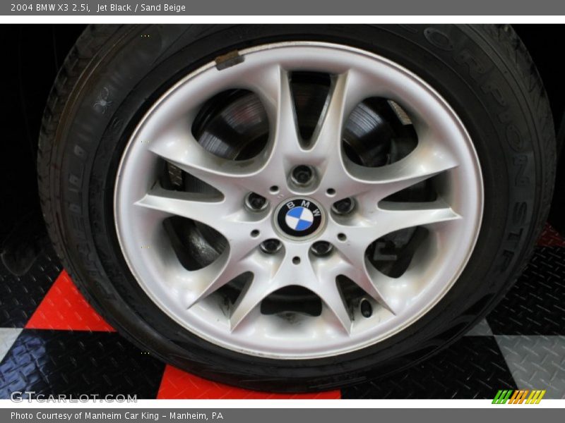 Jet Black / Sand Beige 2004 BMW X3 2.5i