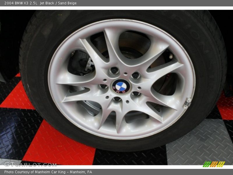 Jet Black / Sand Beige 2004 BMW X3 2.5i