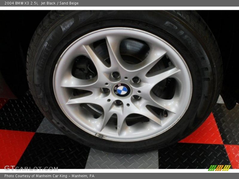 Jet Black / Sand Beige 2004 BMW X3 2.5i