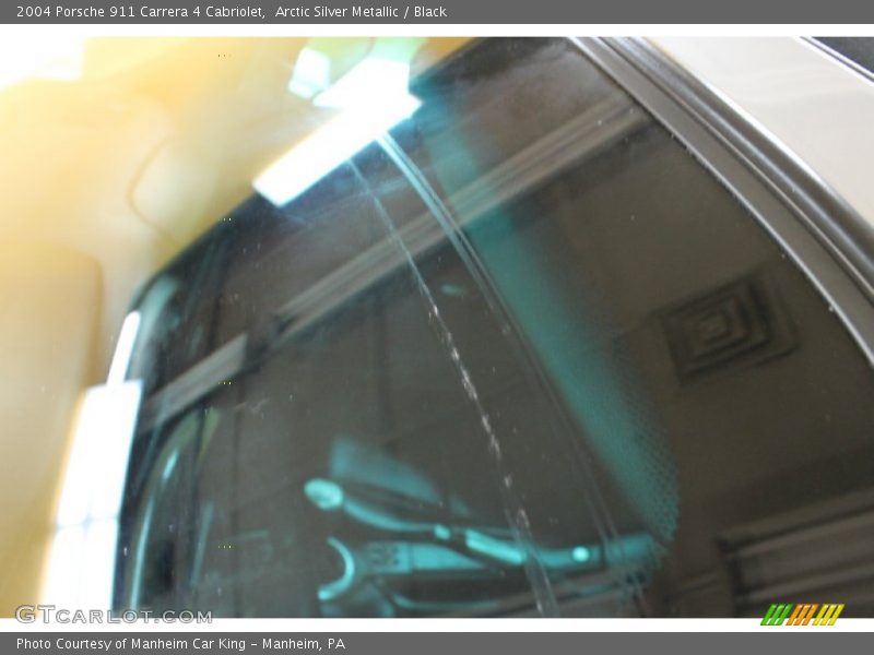 Arctic Silver Metallic / Black 2004 Porsche 911 Carrera 4 Cabriolet