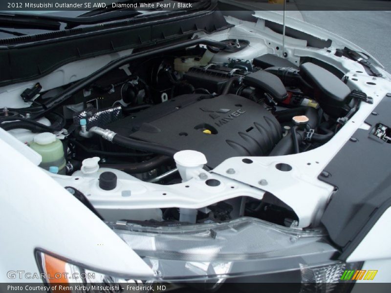 Diamond White Pearl / Black 2012 Mitsubishi Outlander SE AWD