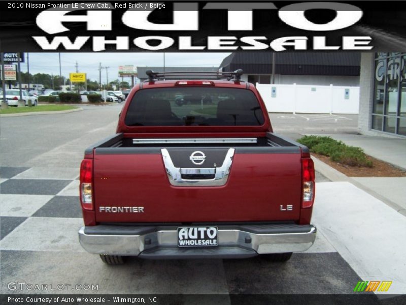 Red Brick / Beige 2010 Nissan Frontier LE Crew Cab