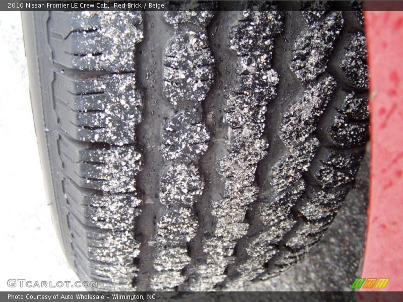 Red Brick / Beige 2010 Nissan Frontier LE Crew Cab
