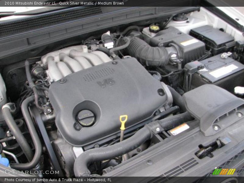 Quick Silver Metallic / Medium Brown 2010 Mitsubishi Endeavor LS