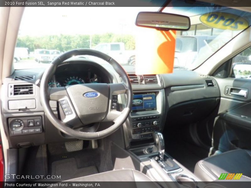 Sangria Red Metallic / Charcoal Black 2010 Ford Fusion SEL