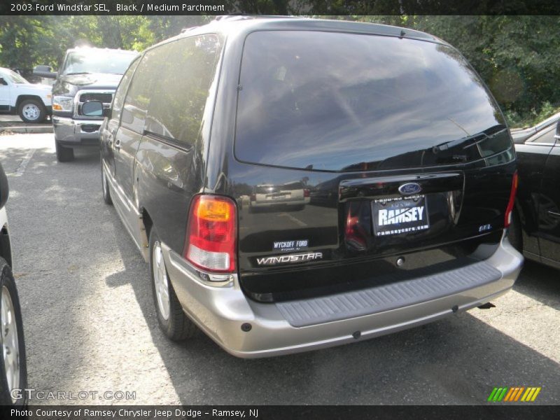 Black / Medium Parchment 2003 Ford Windstar SEL