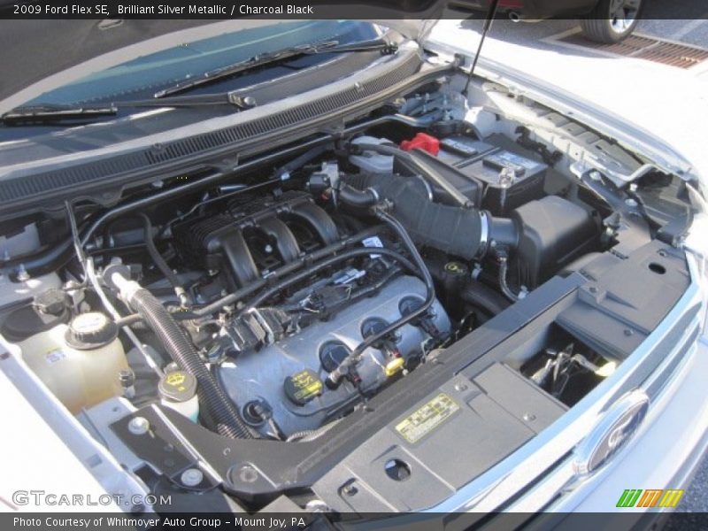 Brilliant Silver Metallic / Charcoal Black 2009 Ford Flex SE