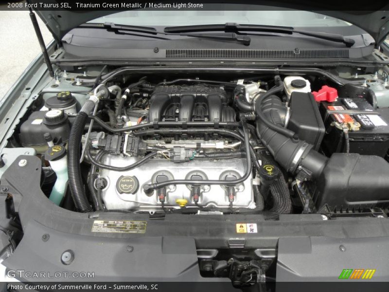 Titanium Green Metallic / Medium Light Stone 2008 Ford Taurus SEL