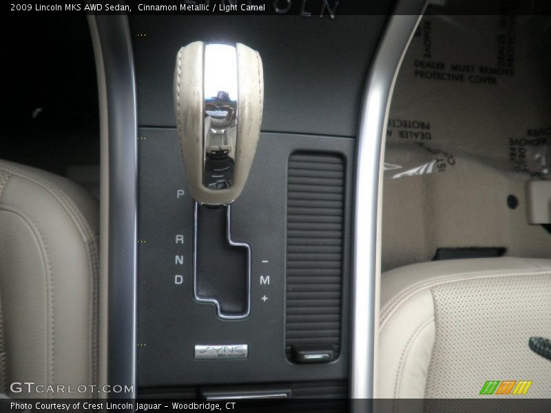 Cinnamon Metallic / Light Camel 2009 Lincoln MKS AWD Sedan