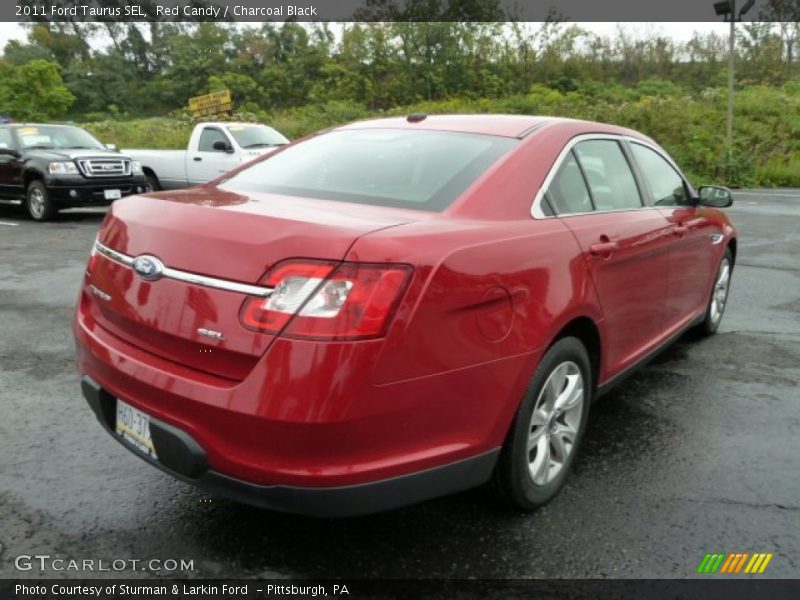 Red Candy / Charcoal Black 2011 Ford Taurus SEL