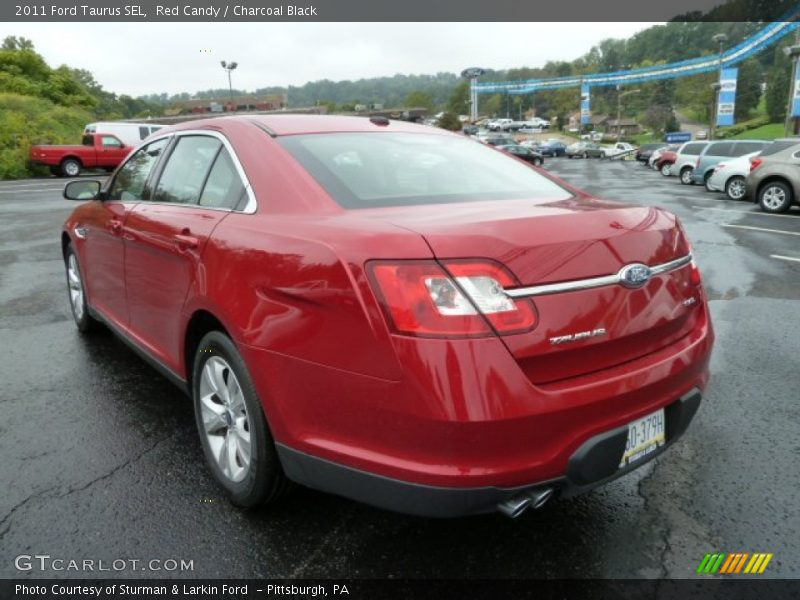 Red Candy / Charcoal Black 2011 Ford Taurus SEL