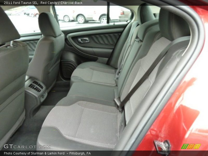 Red Candy / Charcoal Black 2011 Ford Taurus SEL