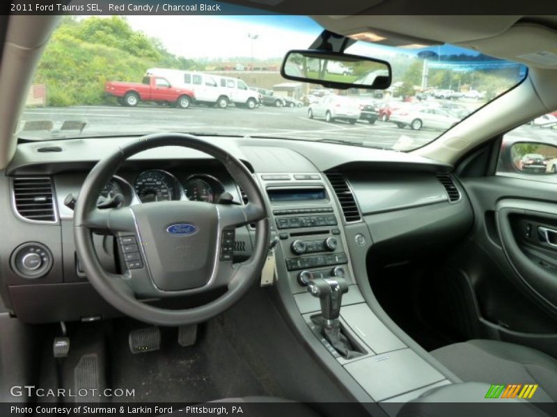Red Candy / Charcoal Black 2011 Ford Taurus SEL
