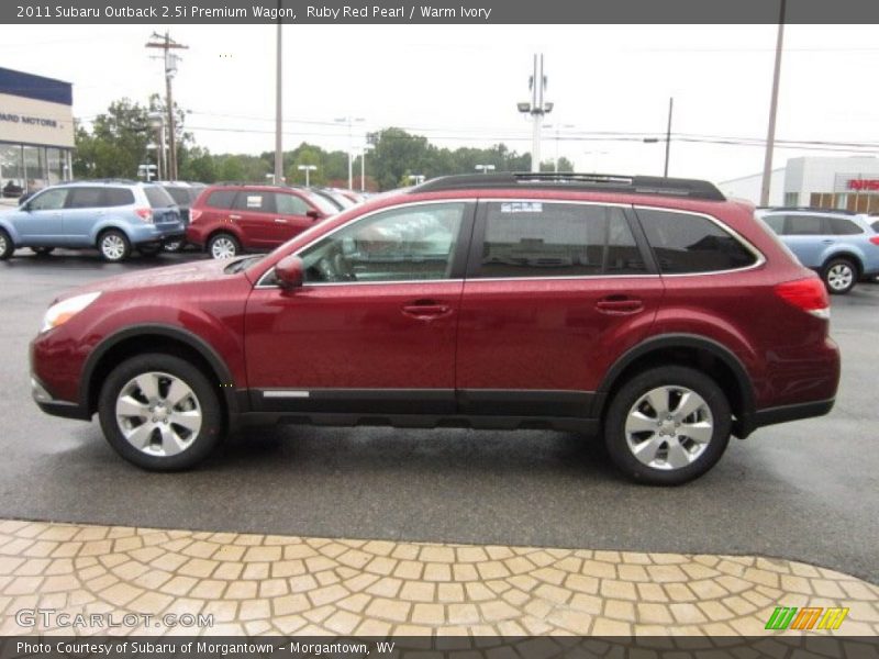 Ruby Red Pearl / Warm Ivory 2011 Subaru Outback 2.5i Premium Wagon