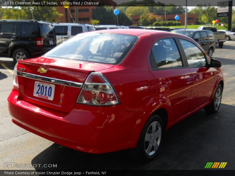 Victory Red / Charcoal 2010 Chevrolet Aveo LT Sedan