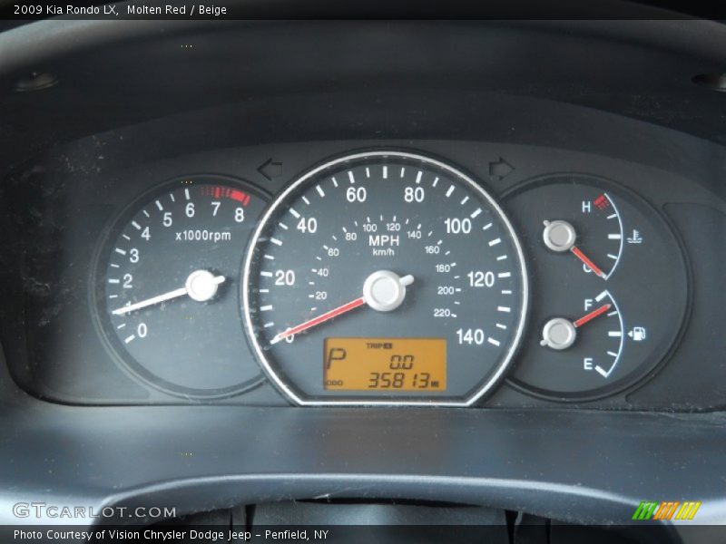 Molten Red / Beige 2009 Kia Rondo LX