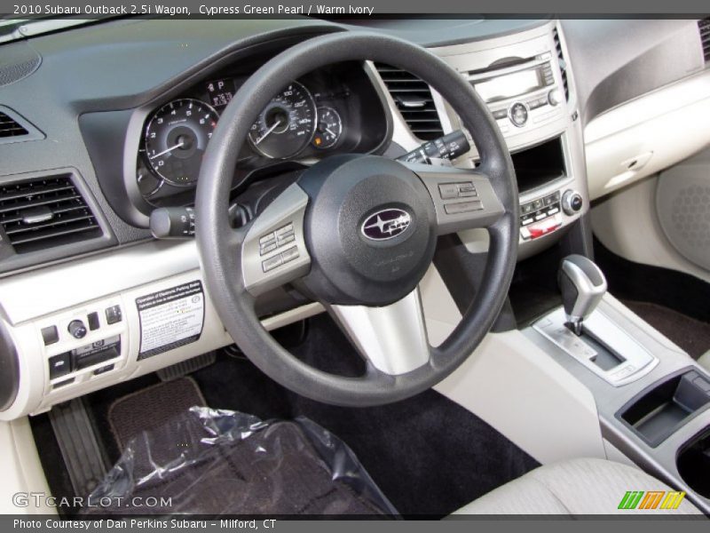 Dashboard of 2010 Outback 2.5i Wagon