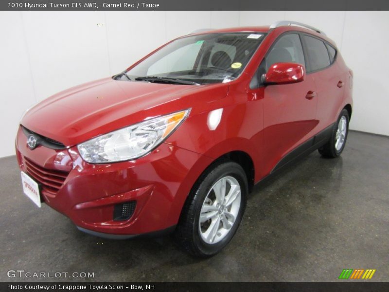 Garnet Red / Taupe 2010 Hyundai Tucson GLS AWD
