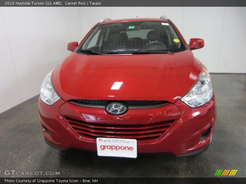 Garnet Red / Taupe 2010 Hyundai Tucson GLS AWD