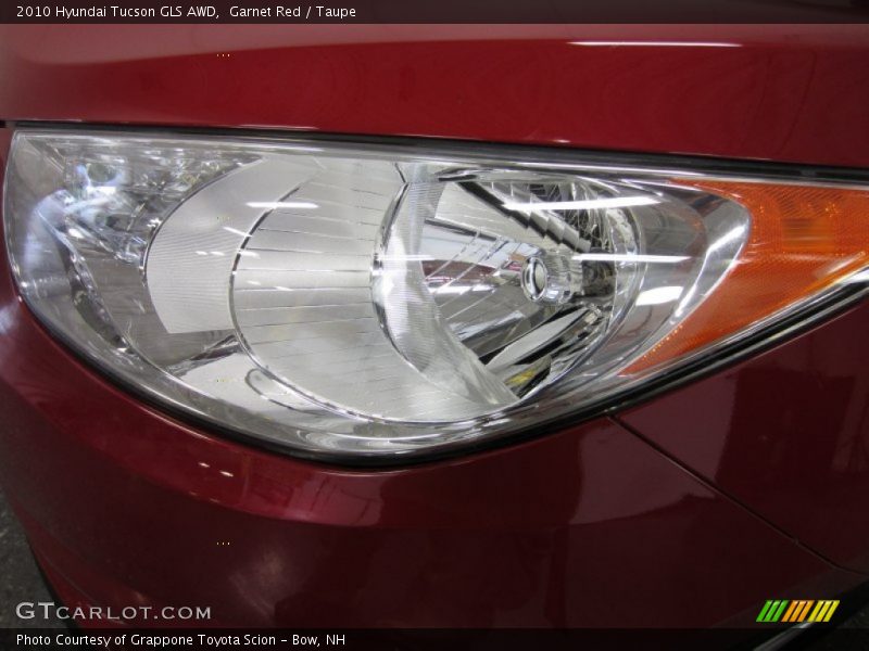 Garnet Red / Taupe 2010 Hyundai Tucson GLS AWD