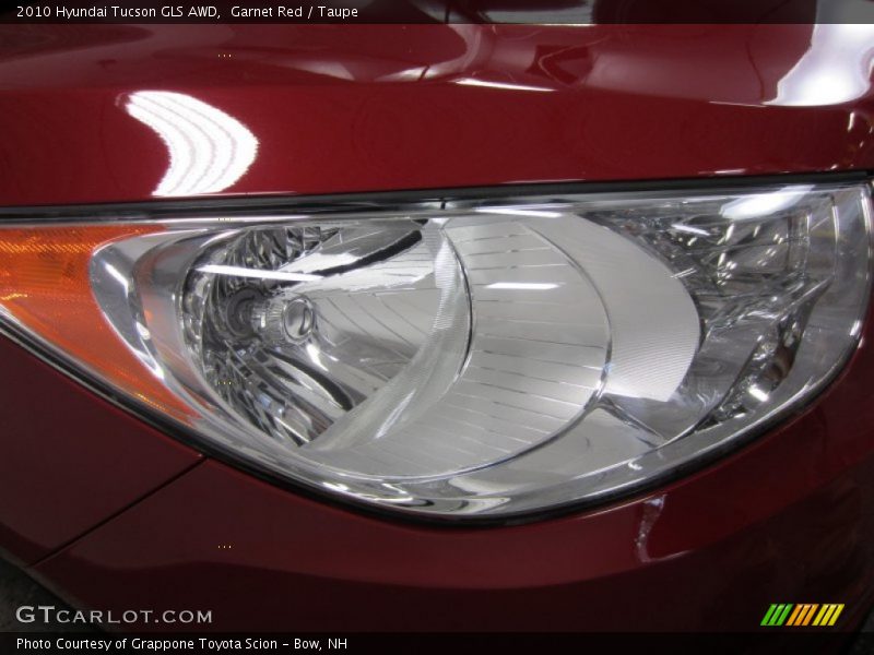 Garnet Red / Taupe 2010 Hyundai Tucson GLS AWD