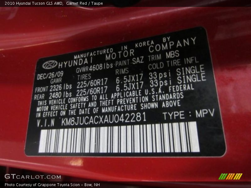 Garnet Red / Taupe 2010 Hyundai Tucson GLS AWD