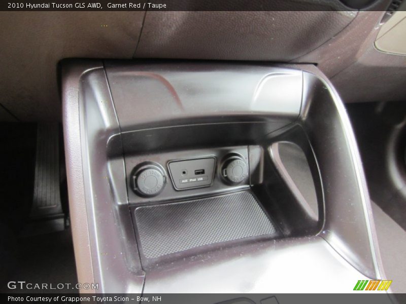 Garnet Red / Taupe 2010 Hyundai Tucson GLS AWD