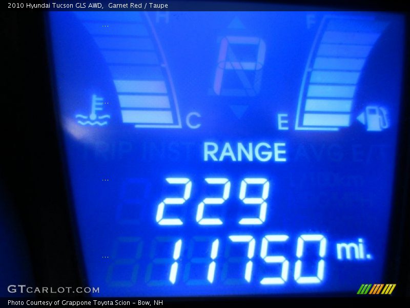 Garnet Red / Taupe 2010 Hyundai Tucson GLS AWD